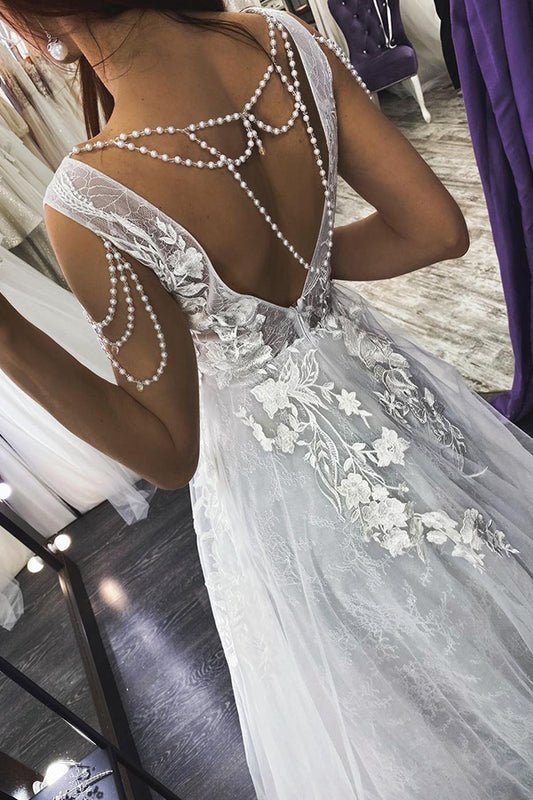 Elegant V-neck Backless A-line Bridal Gown Featuring Pearl Appliques