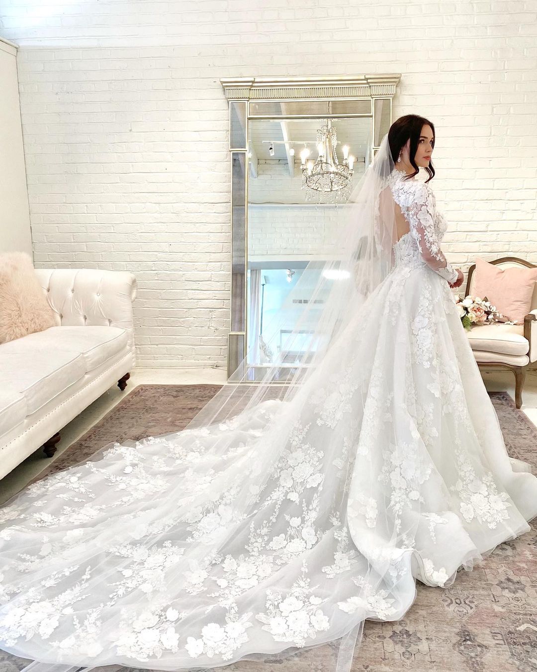 Elegant High Neck A-line Wedding Gown Featuring Lace Sleeves and Open Back