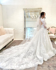 Elegant High Neck A-line Wedding Gown Featuring Lace Sleeves and Open Back