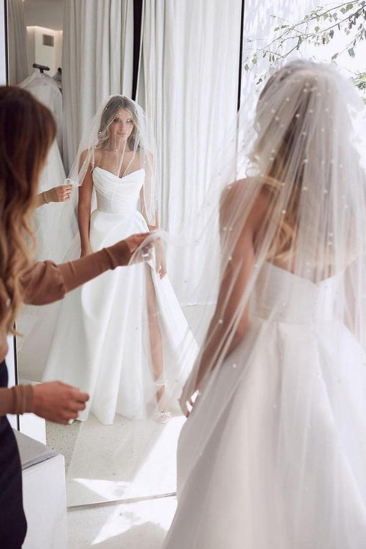 Elegant Sweetheart A-Line Satin Wedding Dress with Floor-length Ruffled Slit