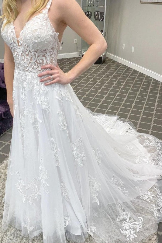 Elegant A-line Wedding Gown with Spaghetti Straps, Deep V-neck, and Lace Appliques on Tulle