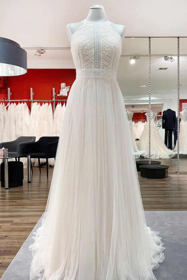 Elegant Backless A-line Wedding Gown with Tulle Lace and Halter Neckline