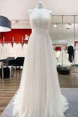 Elegant Backless A-line Wedding Gown with Tulle Lace and Halter Neckline
