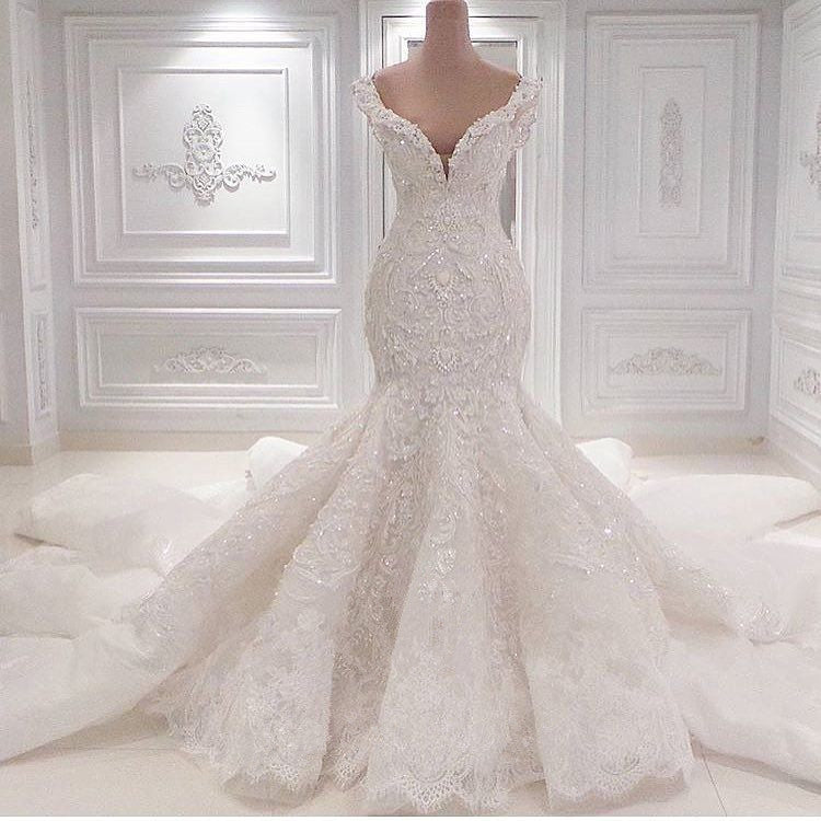 Elegant V-neck Mermaid Wedding Dress with Ruffles and Lace Appliques
