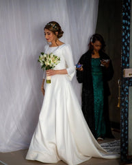 Elegant Long Sleeve Bateau Satin A-line Bridal Gown