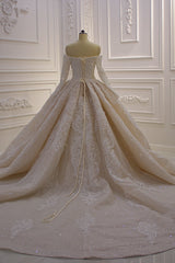 Elegant Off-The-Shoulder Ball Gown Wedding Dress with Lace Appliques and Long Sleeves
