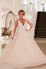 Elegant Backless A-Line Wedding Gown with Deep V-Neck and Spaghetti Straps in Applique Lace