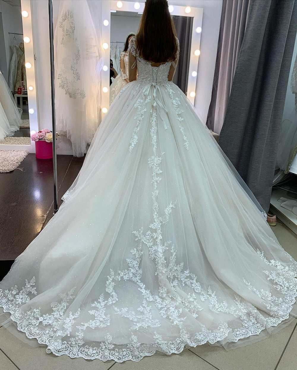 Elegant Floor-length Princess Wedding Dress in Bateau Style with Long Sleeves and Lace Appliques