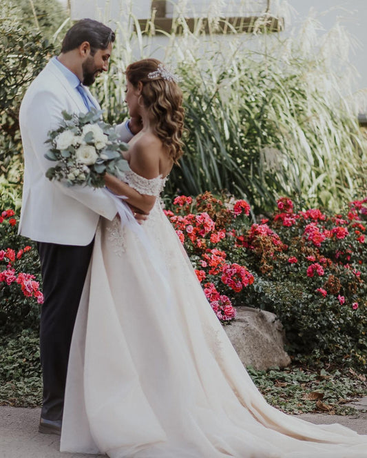 Elegant Off-The-Shoulder Boho Wedding Gown in A-line Tulle and Lace