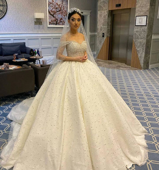 Sweetheart Ball Gown by Miabel: Elegant Off-the-Shoulder Backless Wedding Dress with Tulle, Pearl Beading, and Ruffles