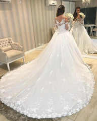 Elegant Off-the-shoulder Princess Wedding Gown with Long Tulle Skirt and Bubble Sleeves