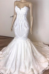 Sweetheart Mermaid Wedding Gown Featuring Long Lace Appliques