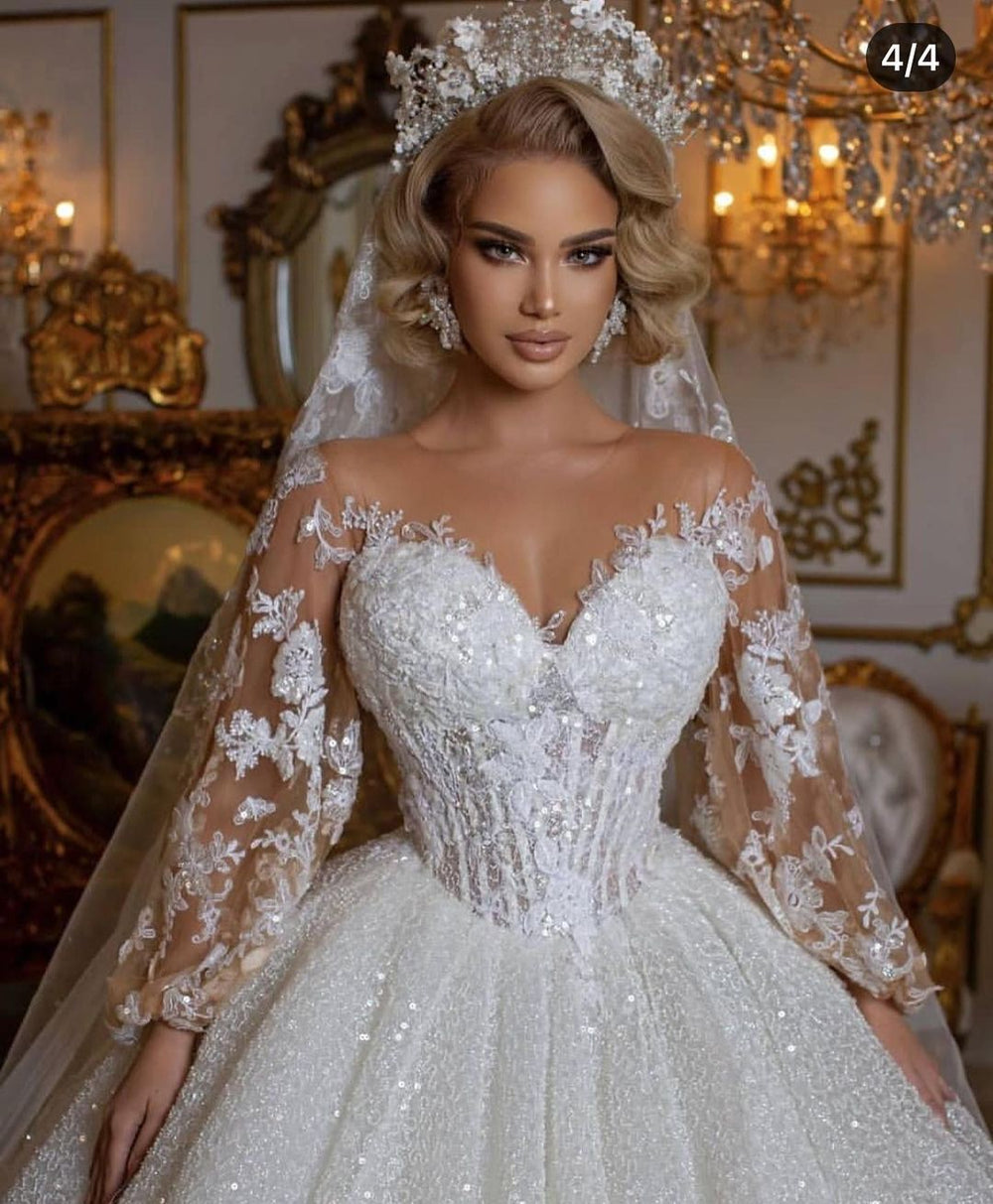 Elegant Ball Gown Wedding Dress Featuring Long Puffy Sleeves and Appliques