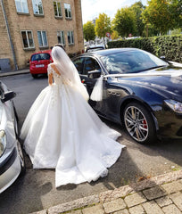 A-line Off-the-shoulder Wedding Dress with Elegant Long Sleeves and Appliques