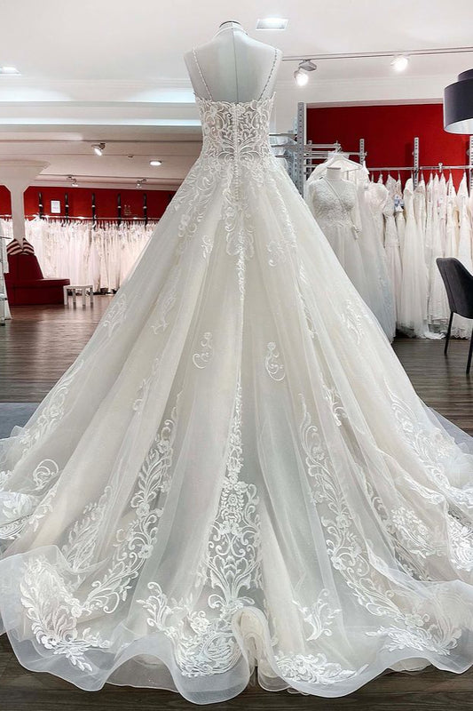 Elegant V-neck Spaghetti-Strap Tulle Ball Gown Bridal Dress Featuring Lace Ruffles
