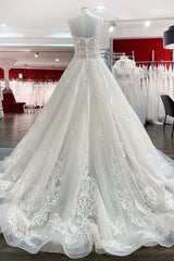 Elegant V-neck Spaghetti-Strap Tulle Ball Gown Bridal Dress Featuring Lace Ruffles