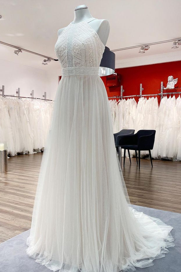 Elegant Backless A-line Wedding Gown with Tulle Lace and Halter Neckline