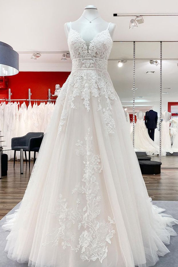 V-neck sleeveless A-line tulle wedding dress with backless design, lace appliques, and ruffles