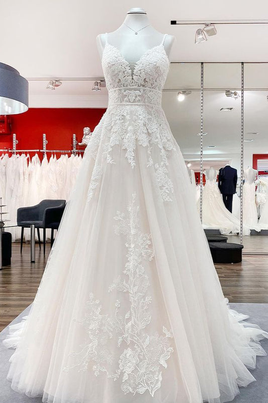 V-neck sleeveless A-line tulle wedding dress with backless design, lace appliques, and ruffles