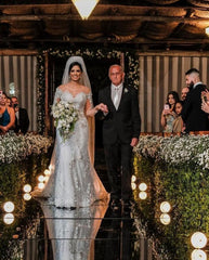 Elegant Off-the-Shoulder Mermaid Wedding Gown with Lace Appliques and Long Sleeves