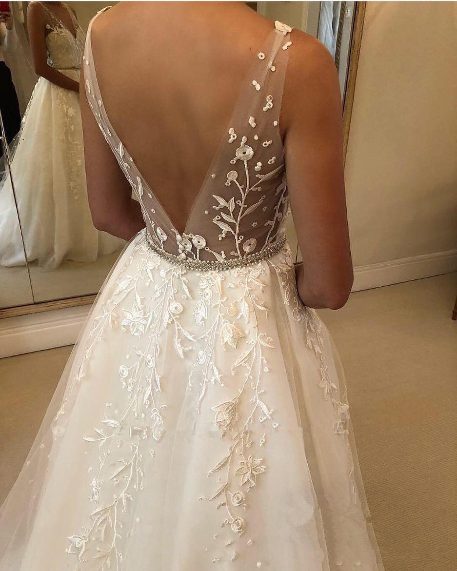 Elegant Sweetheart A-line Wedding Gown with Open Back and Long Tulle