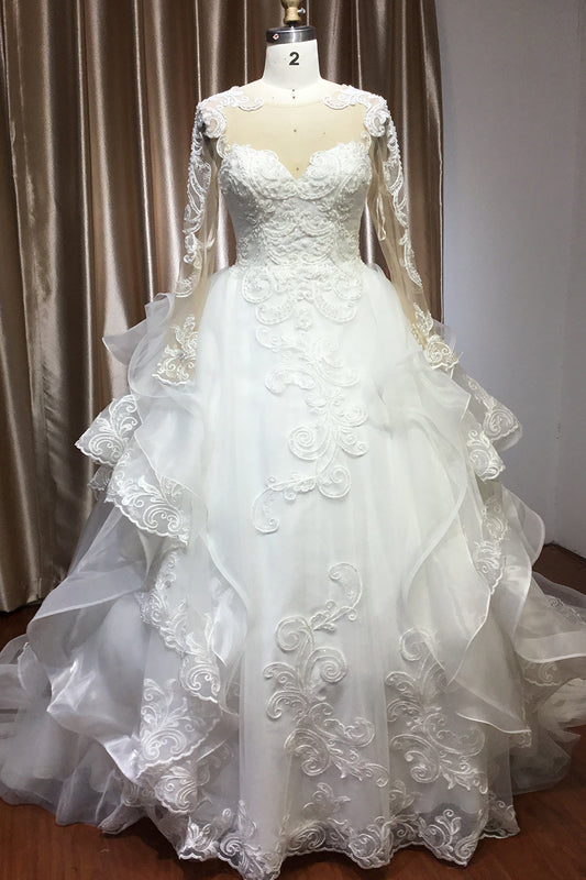 Elegant Long Sleeve Ruffled Ball Gown Wedding Dress Featuring Lace Appliques