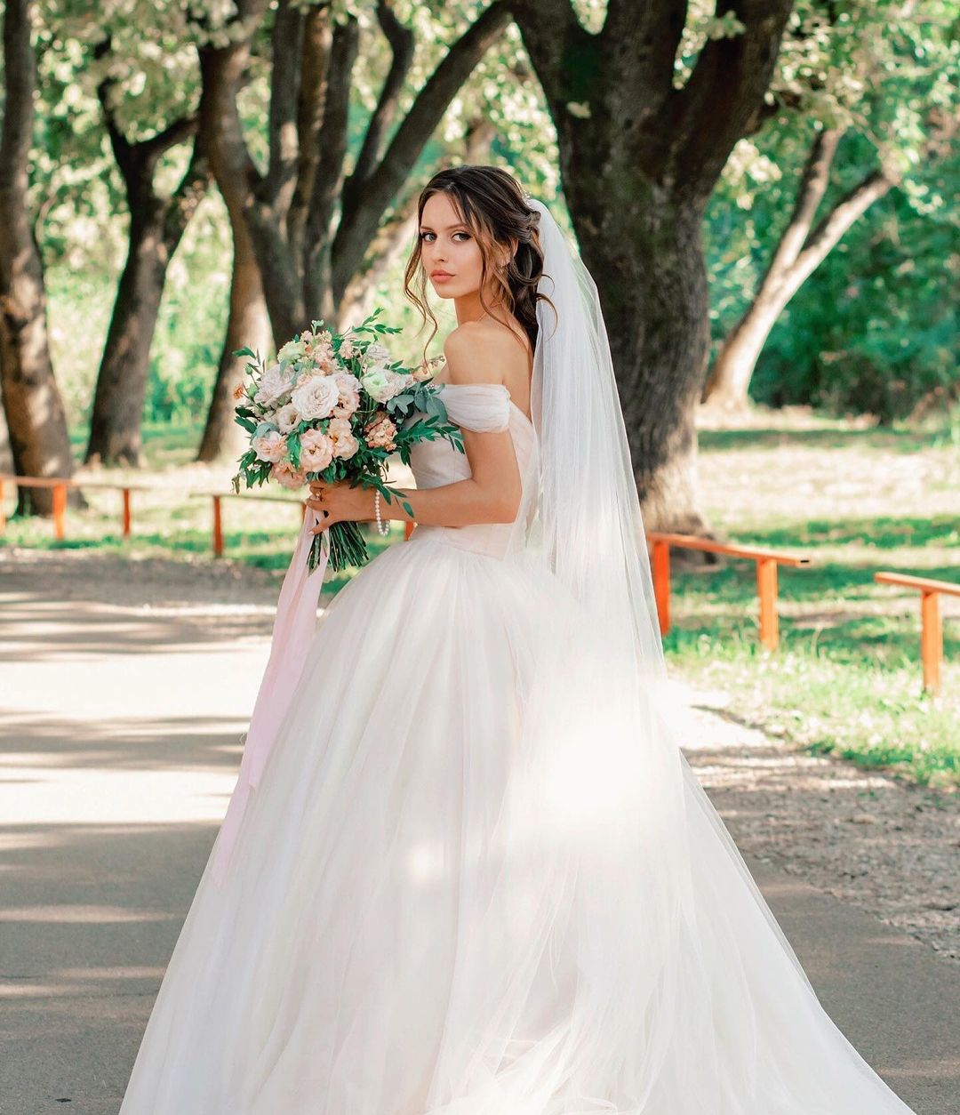 Elegant A-line Long Tulle Wedding Gown with Off-the-shoulder Neckline and Chapel Train