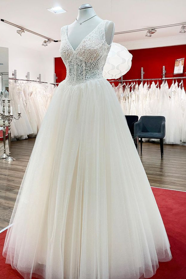 Elegant Ivory Princess Wedding Dress with V-neck, Long Ruffles, and Tulle Lace