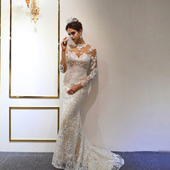 Elegant Sweetheart A-Line Wedding Gown with Long Sleeves and Lace Appliques