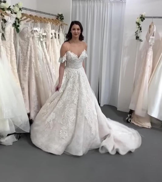 Elegant A-line Wedding Gown with Spaghetti Straps and Backless Tulle Lace