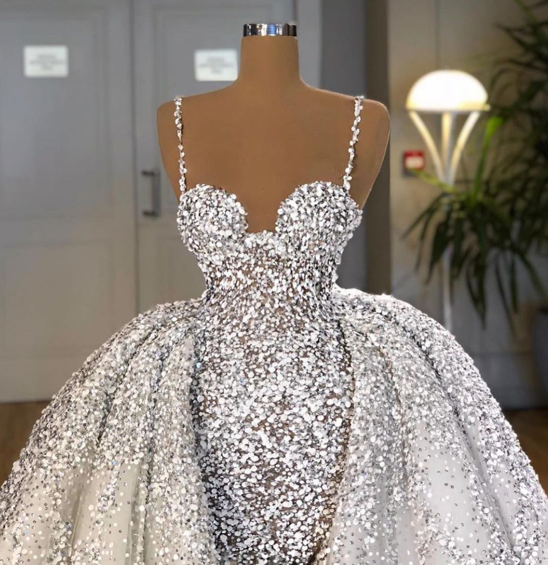 Sweetheart Mermaid Wedding Dress with Elegant Sequins and Ruffled Train