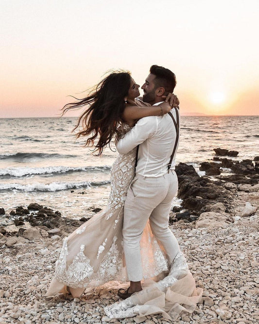 Elegant Lace Backless Mermaid Wedding Dress with Long V-neck and Floral Details