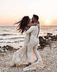Elegant Lace Backless Mermaid Wedding Dress with Long V-neck and Floral Details
