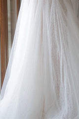 Sleeveless White A-Line Wedding Dress with Elegant Tulle, Spaghetti Straps, Sequins, and Lace