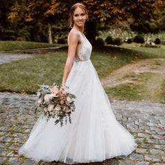 Elegant Floral A-Line Wedding Dress with Deep V-neck and Open Back