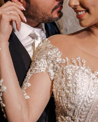 Elegant Off-the-Shoulder Mermaid Wedding Gown with Lace Appliques and Long Sleeves