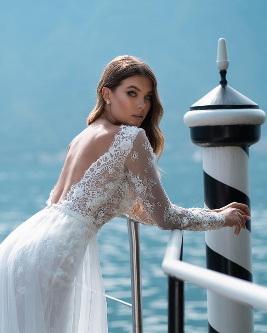 Elegant Long-Sleeve Boho Wedding Dress with V-neck and Lace Backless Design