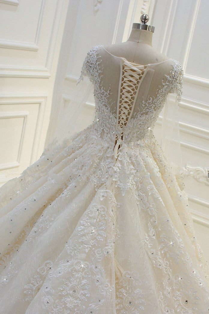 Elegant Beaded Bateau Ball Gown Wedding Dress with Lace Appliques and Long Sleeves