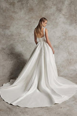 Elegant Ivory Satin A-Line Long Wedding Gown with Spaghetti Straps and Pleated Detail
