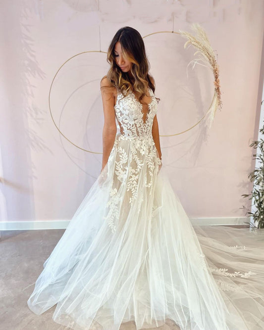 A-Line Floor-Length Wedding Dress with Appliques Lace, Deep V-Neck and Backless Tulle Design
