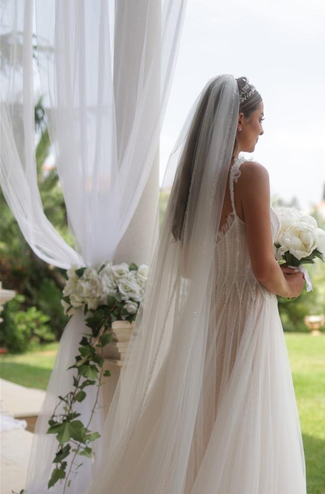 Sleeveless White A-Line Wedding Dress with Elegant Tulle, Spaghetti Straps, Sequins, and Lace
