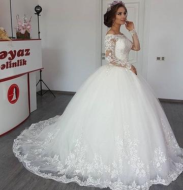 Elegant Off-the-Shoulder Ball Gown with Long Sleeves and Lace Appliques