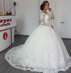 Elegant Off-the-Shoulder Ball Gown with Long Sleeves and Lace Appliques