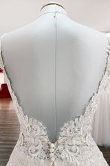 Elegant Sleeveless V-Neck A-line Wedding Gown in Tulle with Lace Ruffles