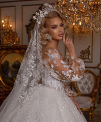 Elegant Ball Gown Wedding Dress Featuring Long Puffy Sleeves and Appliques