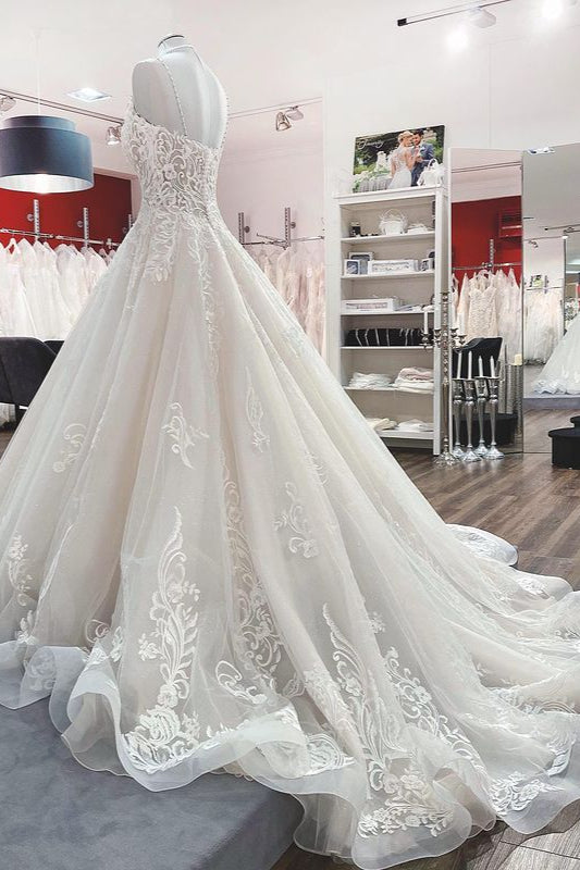 Elegant V-neck Spaghetti-Strap Tulle Ball Gown Bridal Dress Featuring Lace Ruffles