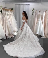 Elegant A-line Wedding Gown with Spaghetti Straps and Backless Tulle Lace