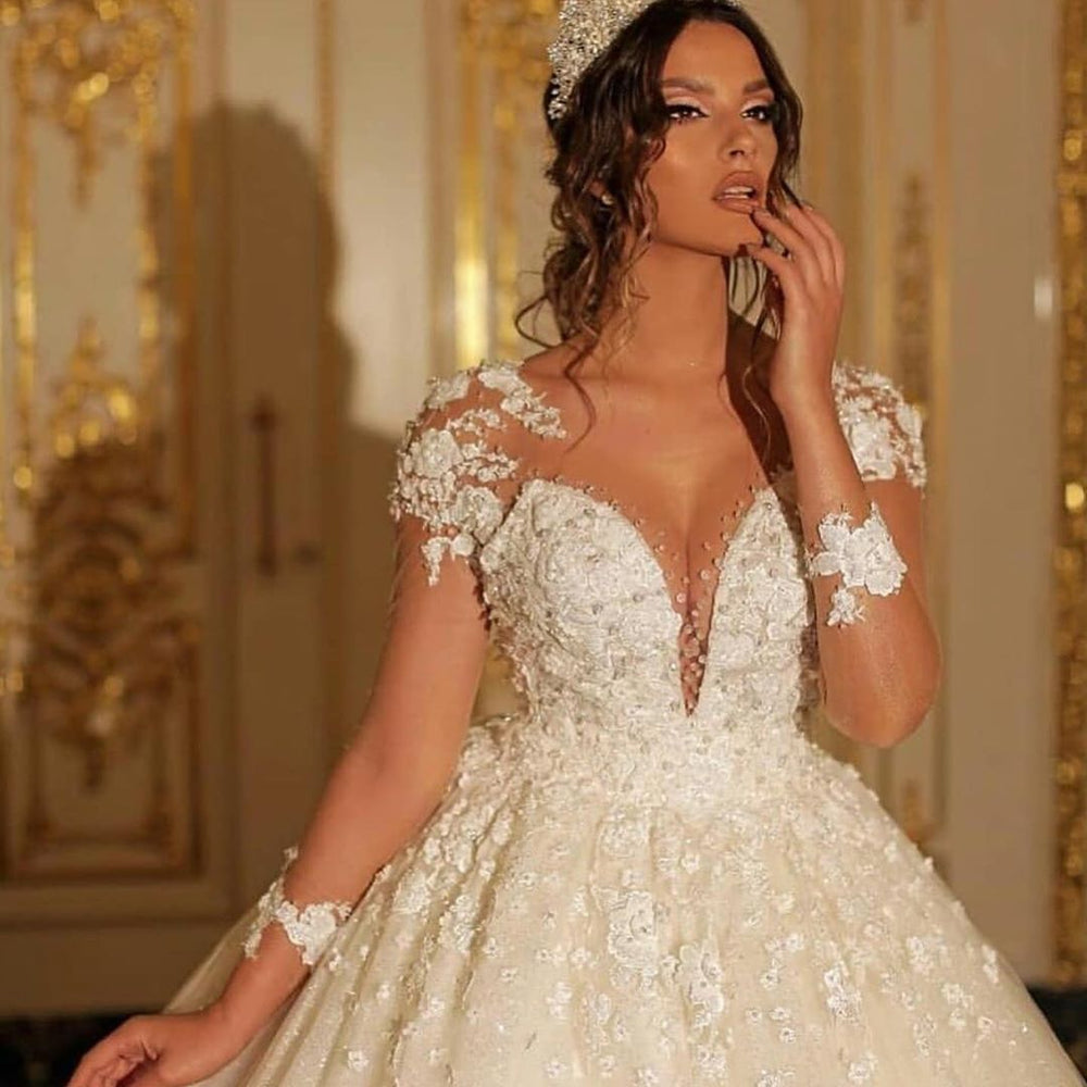 Sweetheart Wedding Dress with Romantic Long Sleeves and Floor-length Tulle Lace Appliques