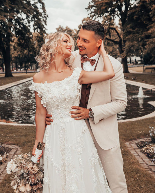 Elegant Off-the-shoulder 3D Floral A-line Wedding Dress with Lace Appliques