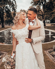 Elegant Off-the-shoulder 3D Floral A-line Wedding Dress with Lace Appliques